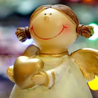 Holiday decoration of angel holding a heart