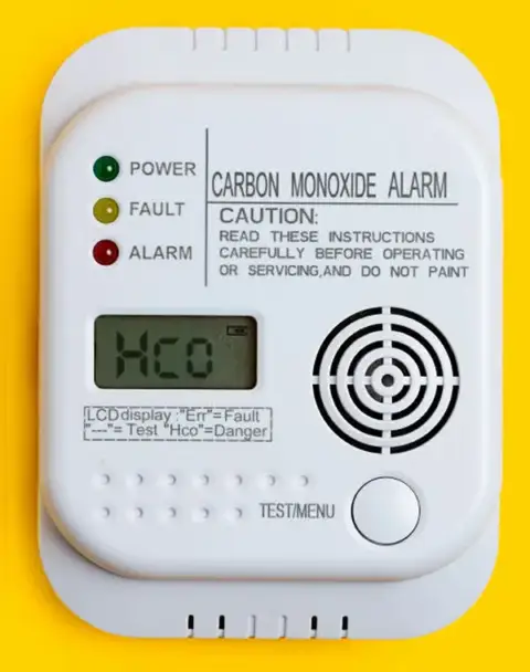 A carbon monoxide detector, and the screen displays Hco which means danger.
